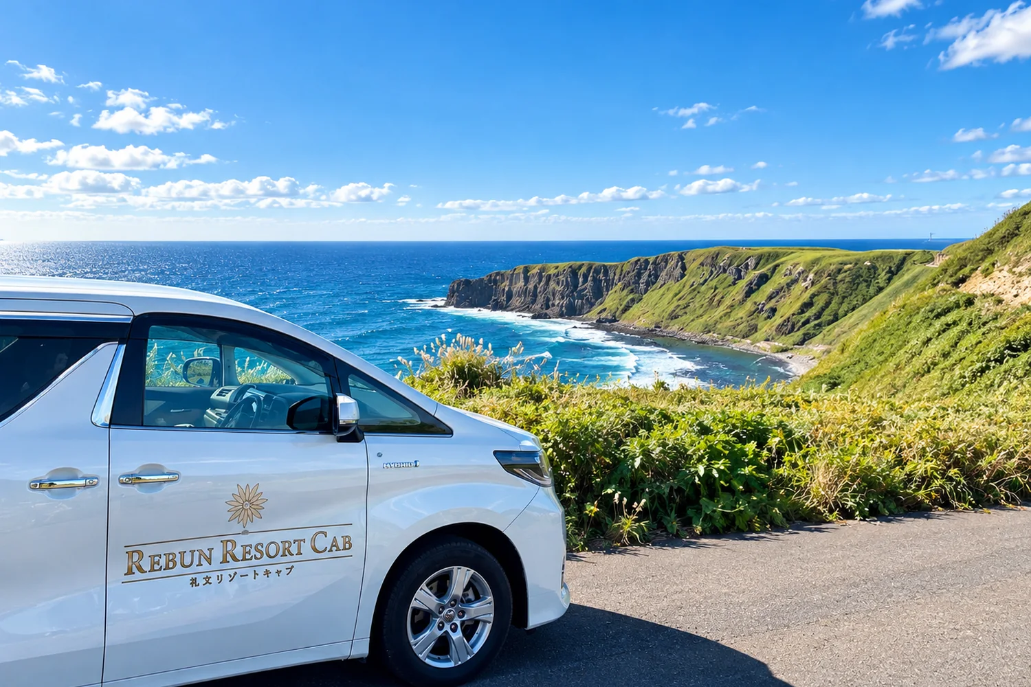 A REBUN RESORT CAB vehicle parked on a road overlooking the sea on Rebun Island